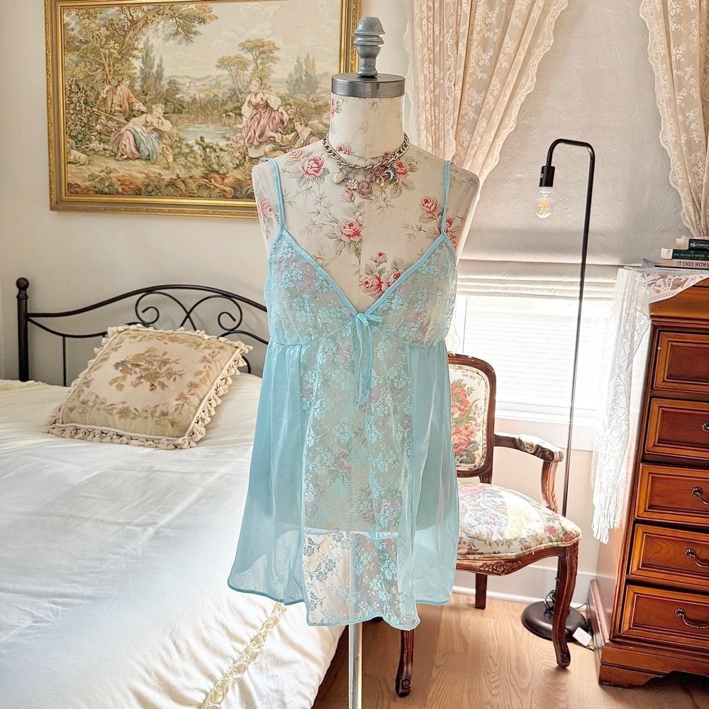 70s vintage fits like a medium aqua blue lace babydoll slip